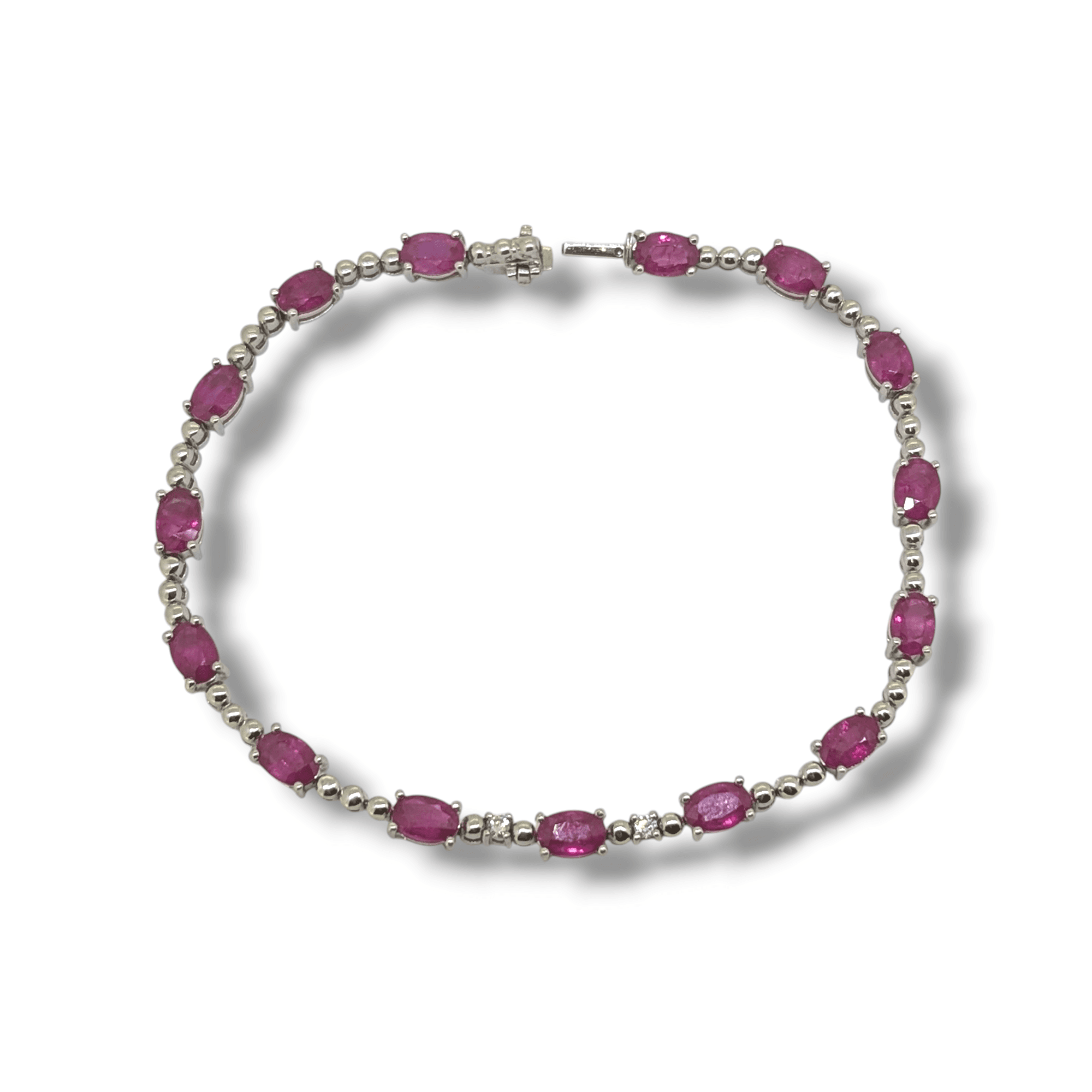 18 Carat White Gold Pink Sapphire & Diamond Line Bracelet